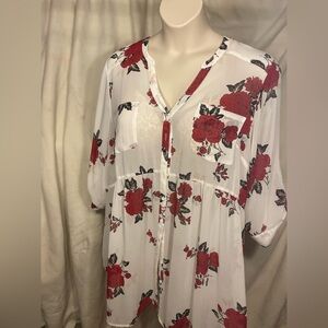 Torrid size 4 semi sheer, baby doll style, hi/low button in front blouse.